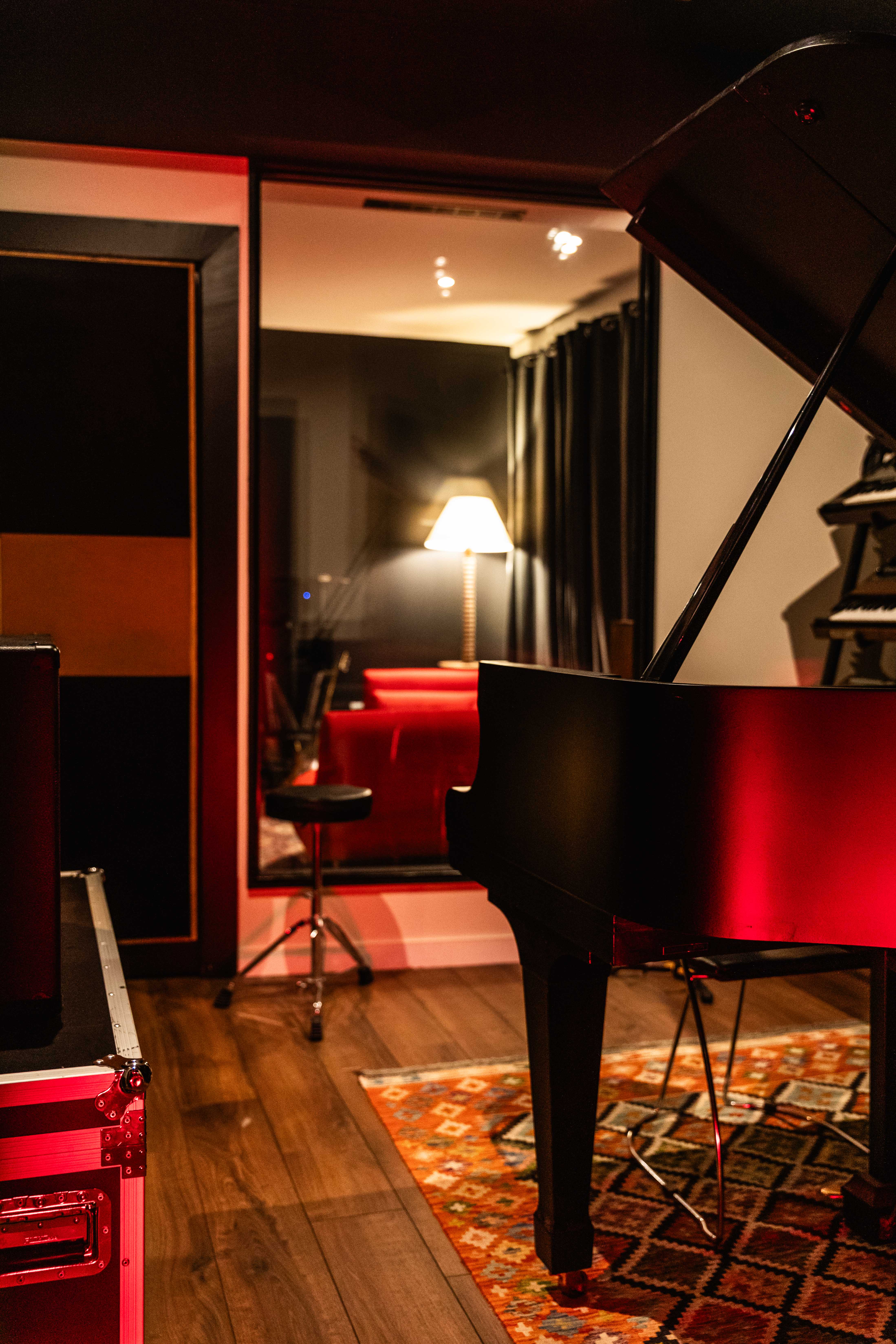 Grand piano in the Lobster recording studio listening room.